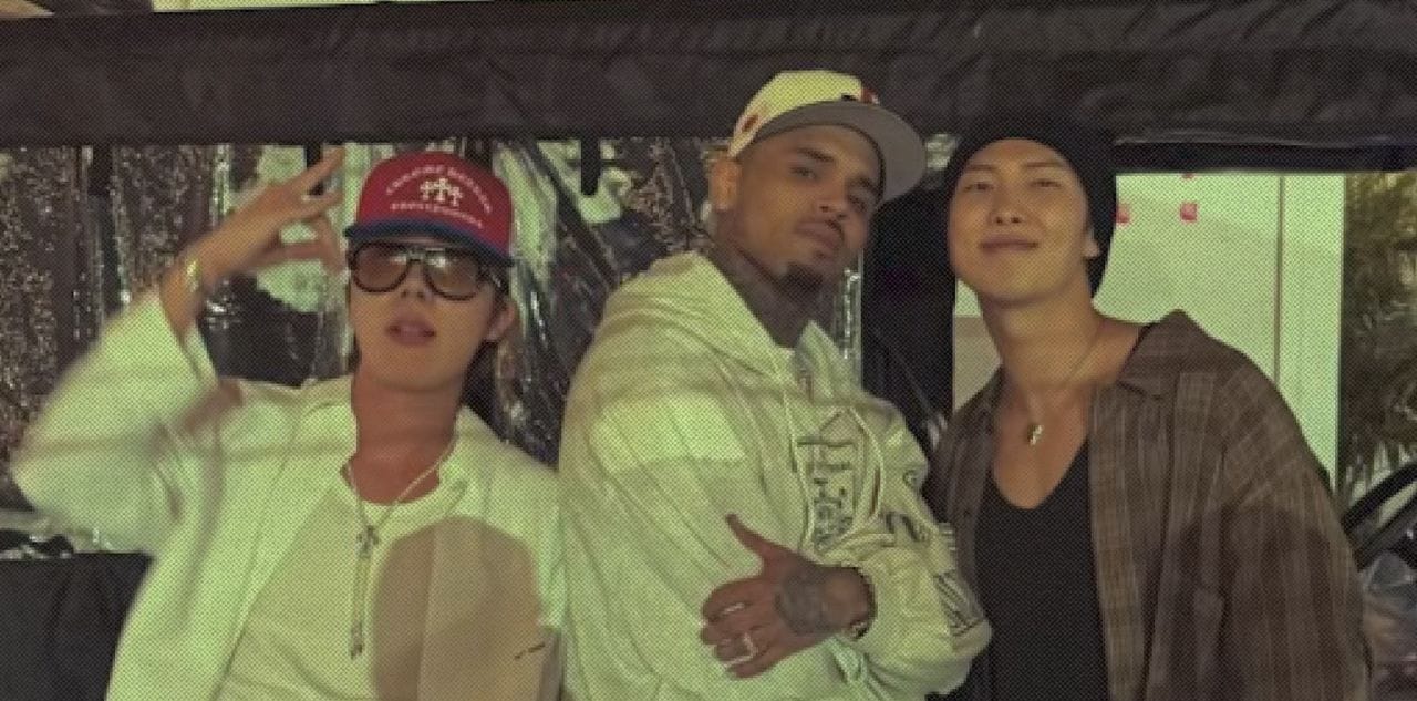 Кадр из ролика  BTS Members RM & J-Hope Spark Backlash Over Chris Brown Concert Appearance || MEAWW
